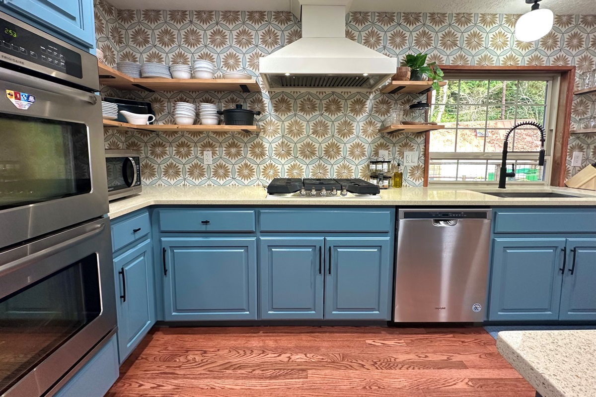 A large gas range (a second 2 burner portable cooktop), double ovens and all the cookware and bakeware you'll need to make delicious meals for even the largest groups.