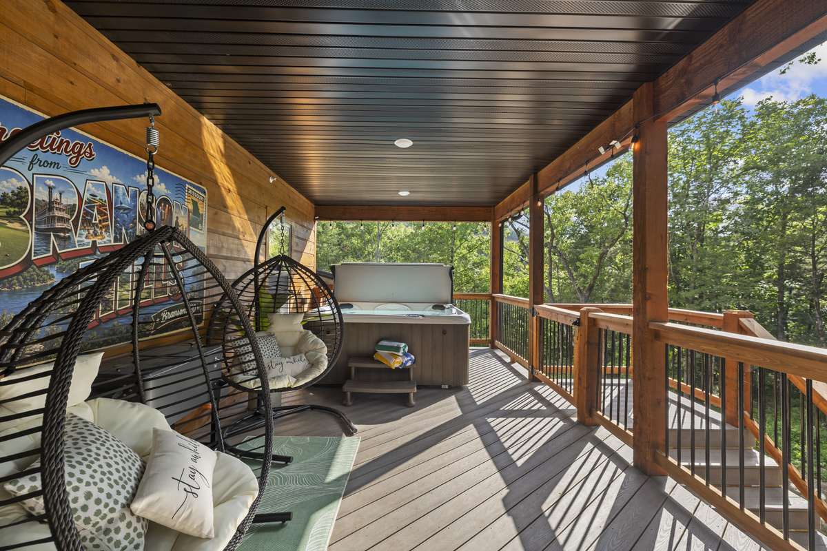 Warm light and comfy chairs as evening settles over the deck.