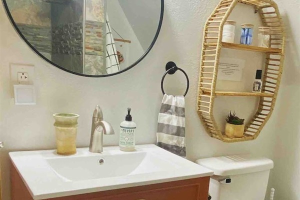 Full bathroom with walk in shower. We’ve got everything you need should you forget something. Shampoo, conditioner and body wash provided.