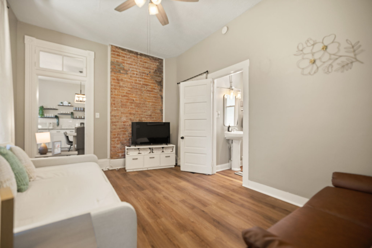 Warm and inviting main living area with a smart TV. Bring your the login to your favorite streaming service and watch your favorite shows!
