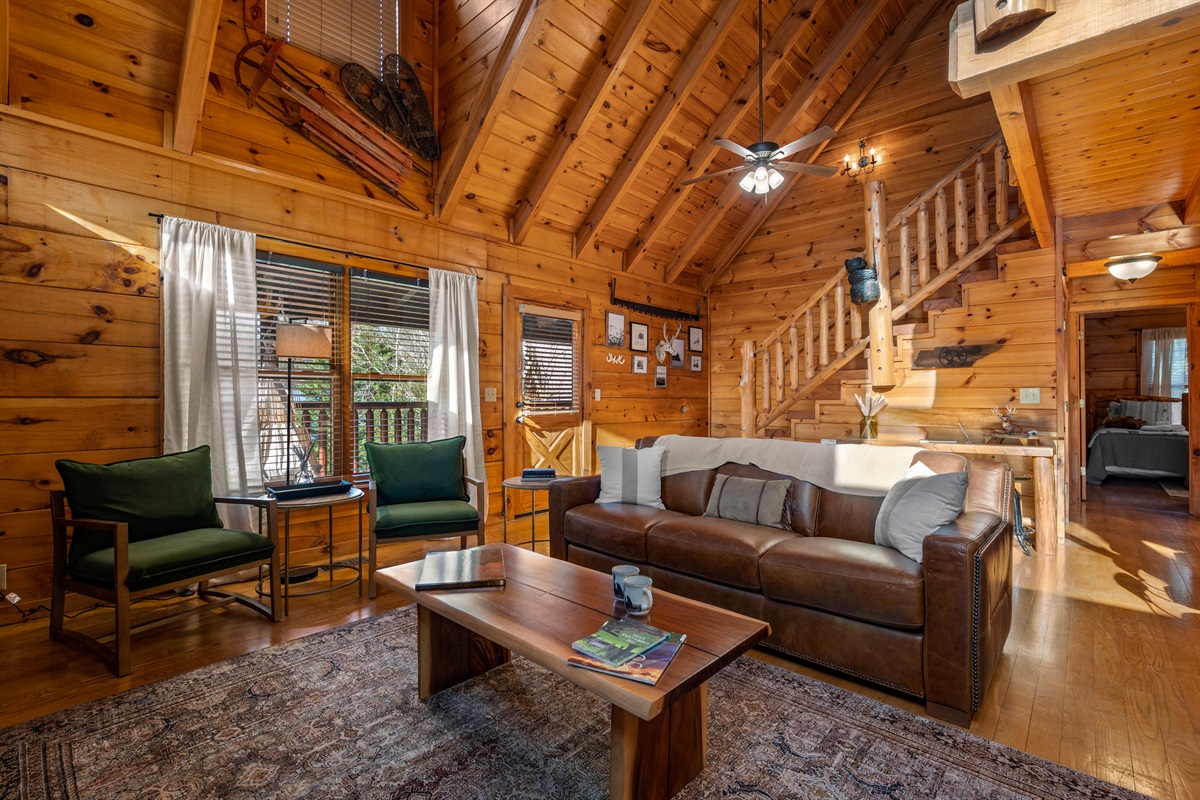 A warm and inviting space designed for slowing down, whether you're enjoying a movie night or simply relaxing after a day in the Smokies.