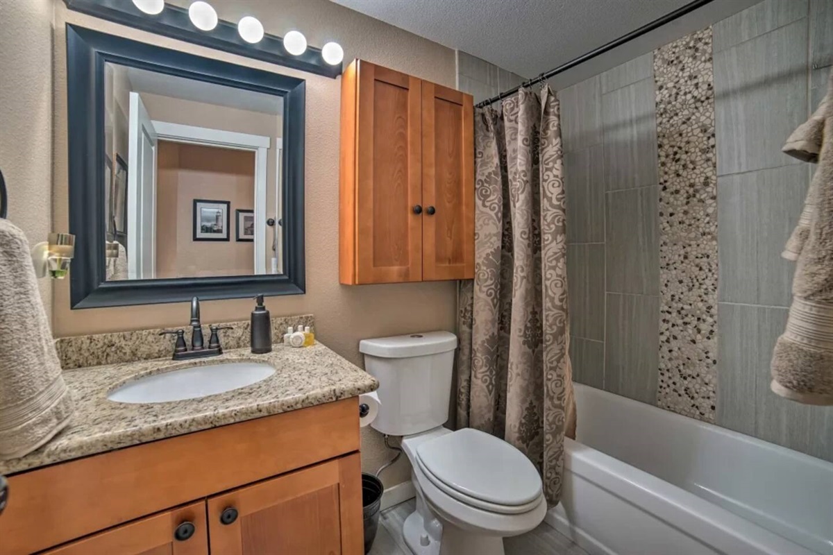 Second bathroom upstairs with shower/tub combination