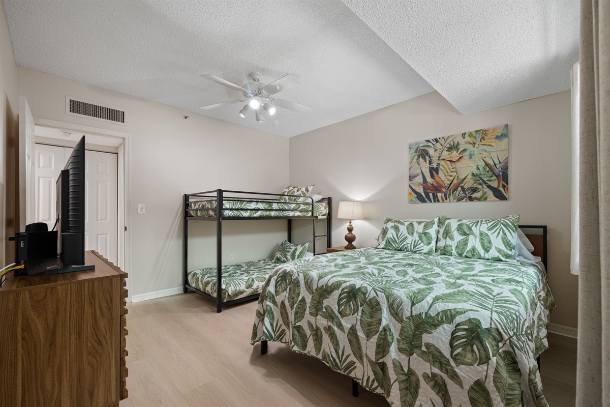 Bedroom 2: Queen & twin bunk beds, sleeps 4.