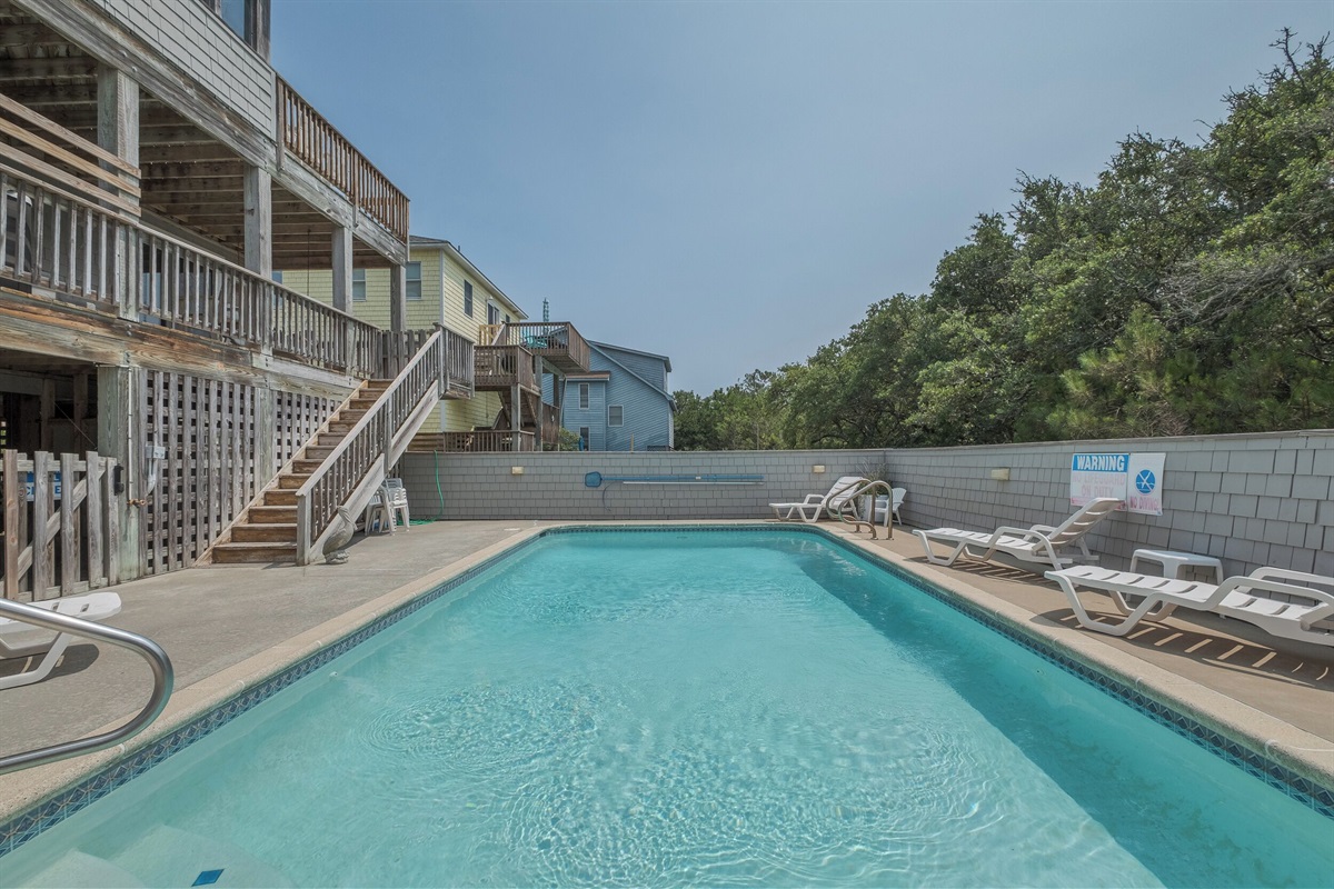 Soak up the sun by the pool with plenty of seating