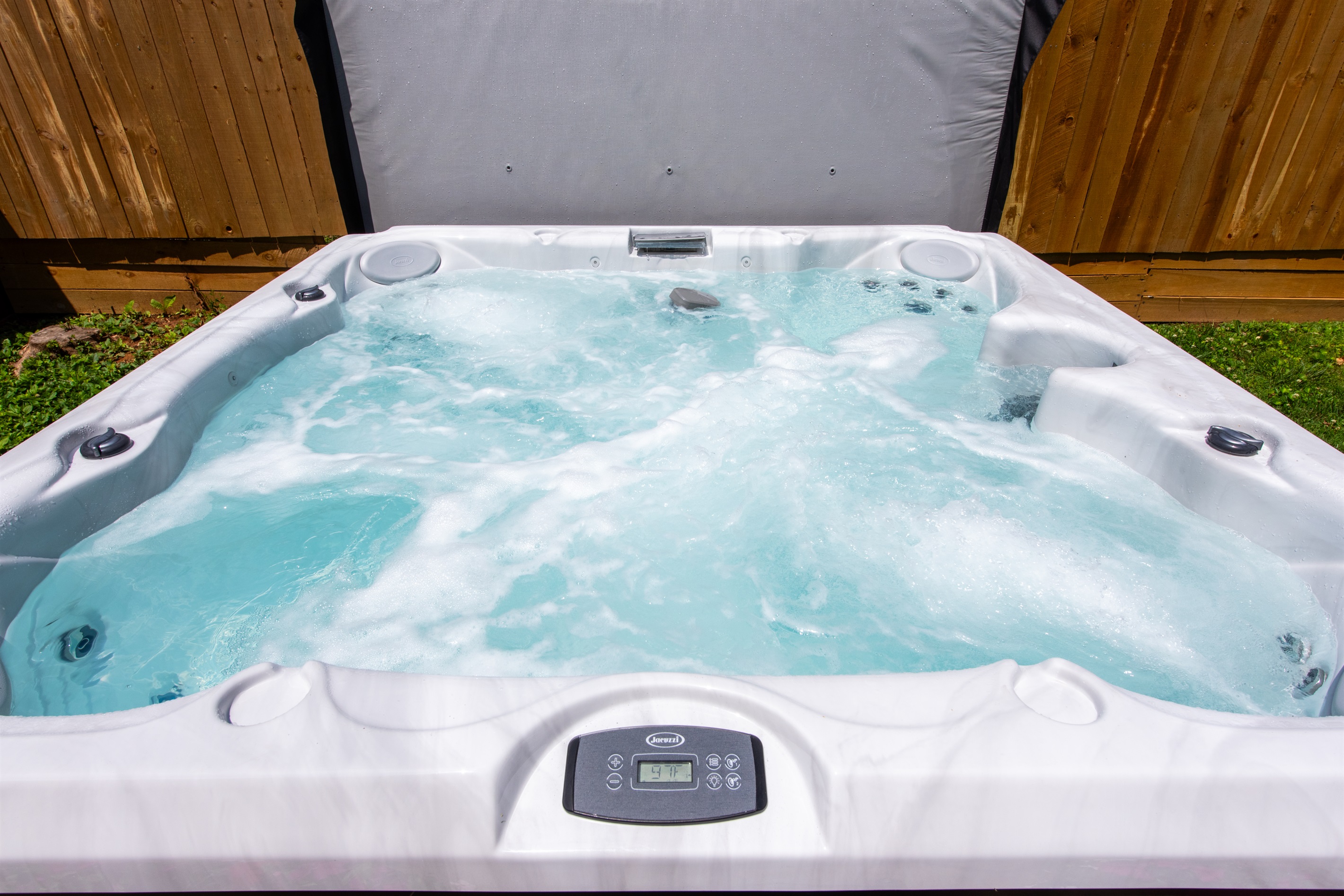 Soak in this inviting hot tub after a Bourbon Trail adventure! Features bubbling jets, a digital control panel (97°F), & private wooden fence —perfect for relaxation any time of year!