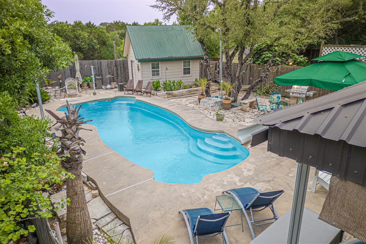 Welcome to your own private Backyard Oasis. Spa jets in pool bench seats & separate hot tub. Natural gas grill, oversized hammock for two, heated pool. Could it get any better?! Come, dive in ️