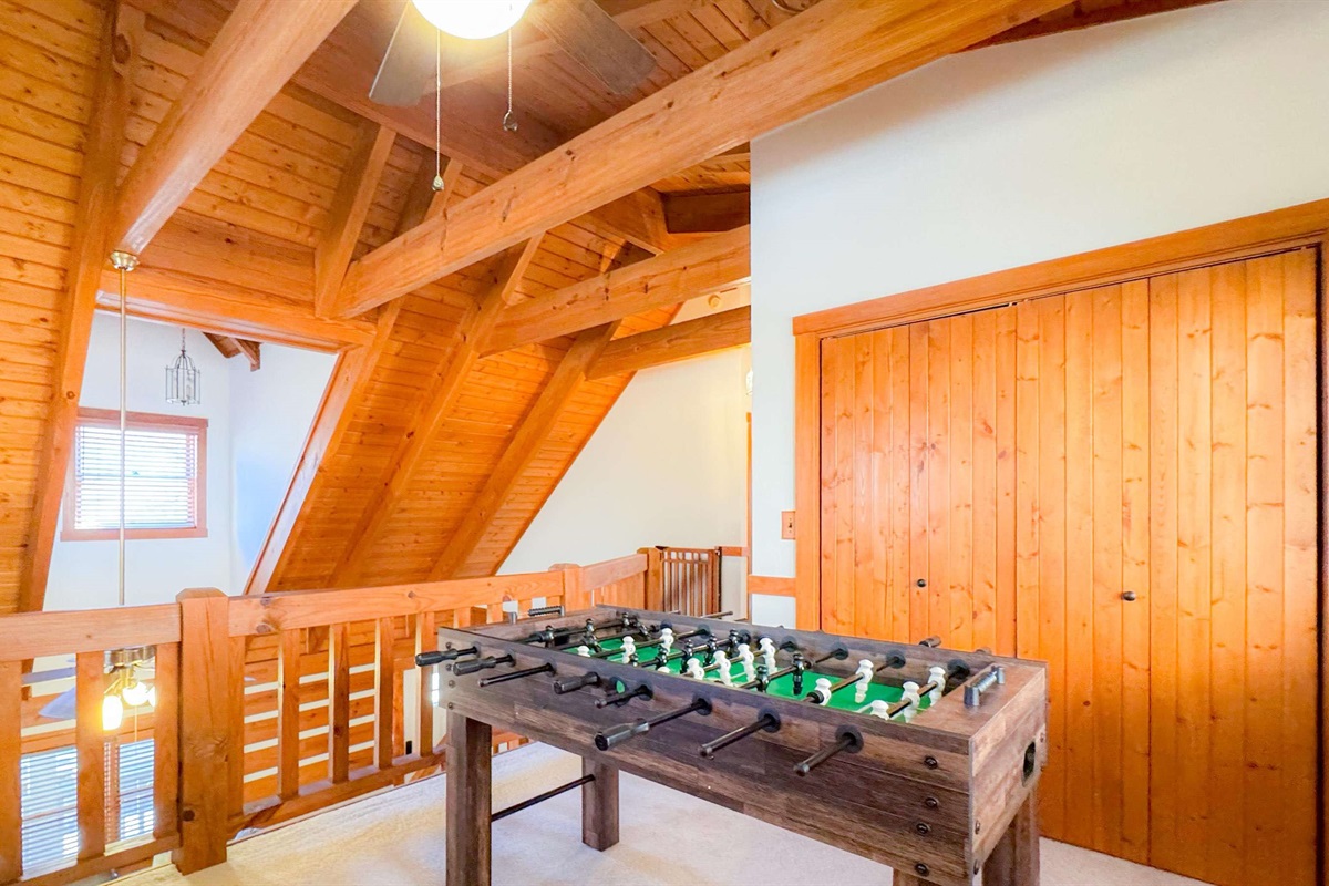 Foosball table in the game room area