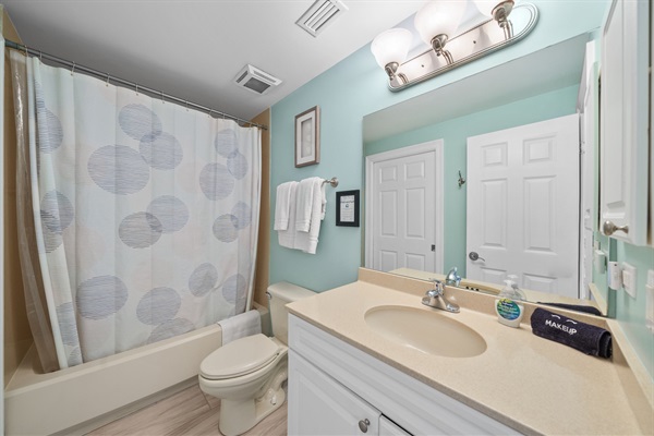 Full bath with access from the second bedroom or hallway.