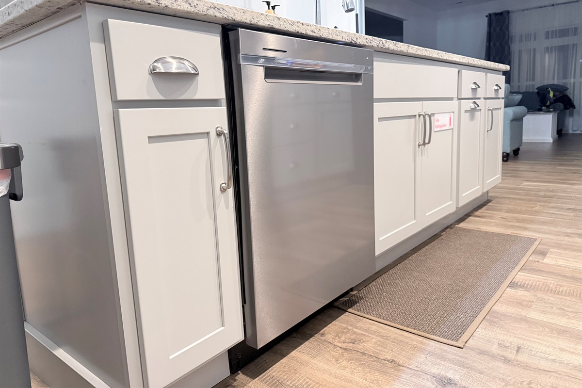 dishwasher and sink located in island