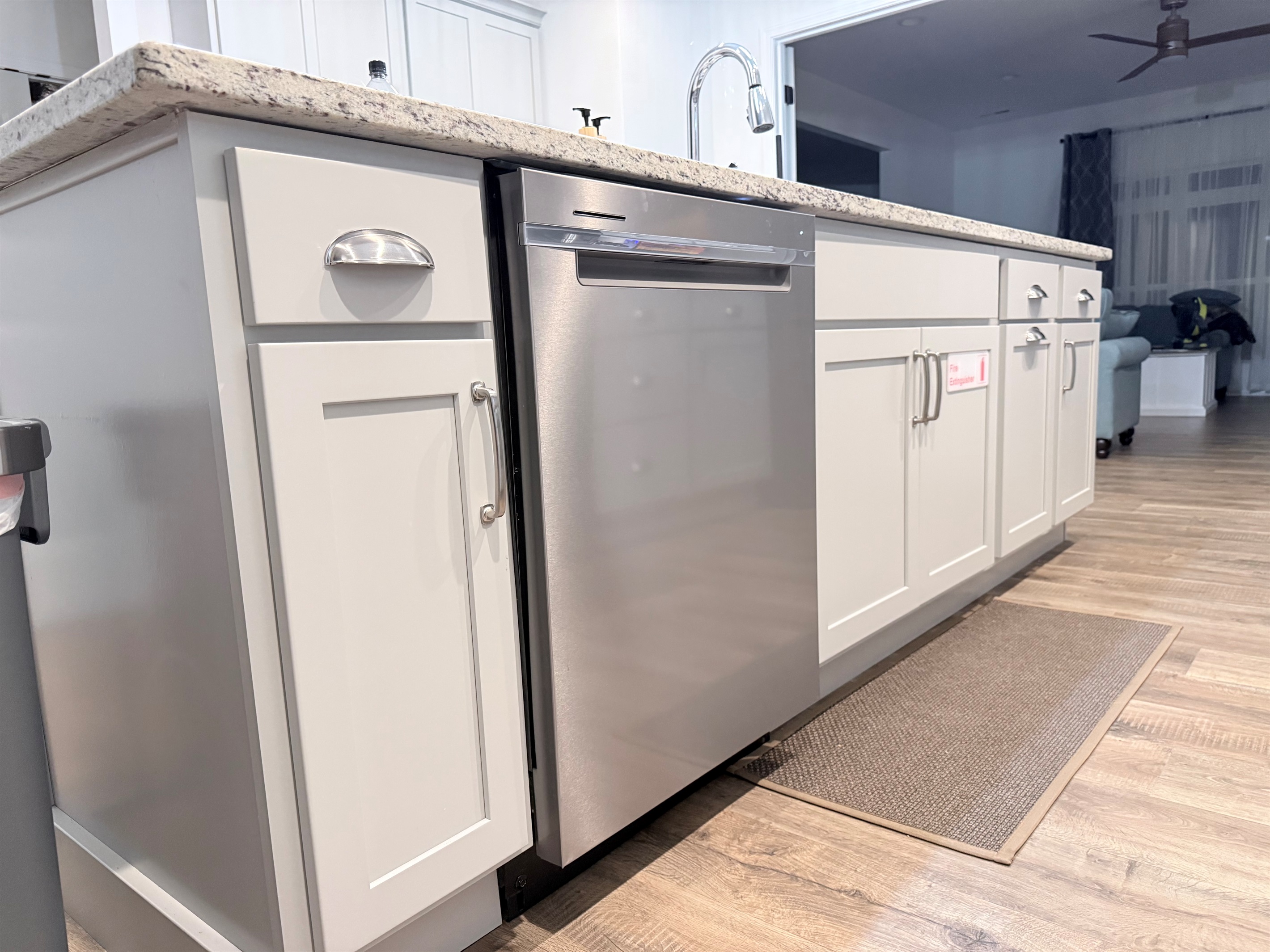 dishwasher and sink located in island