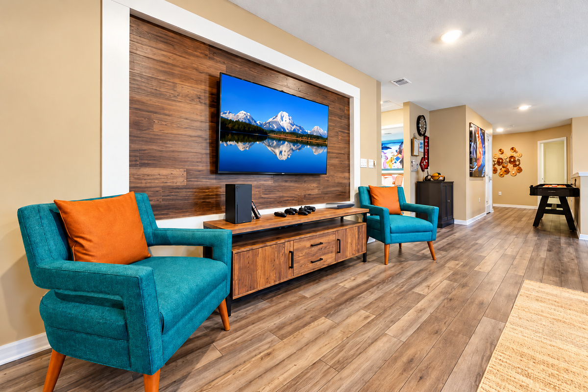 Our upstairs game room also has an Xbox Series X, a cabinet full of board games for all ages, and a smart TV.