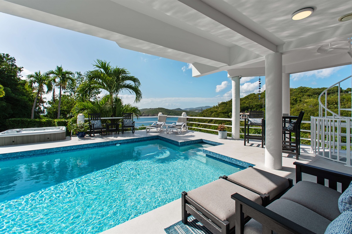 A gorgeous pool with covered and uncovered seating