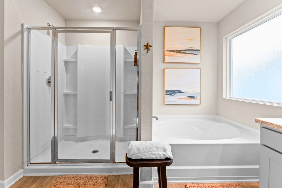 With both a soaking tub and a separate shower, Bathroom 1 gives you options for winding down or refreshing after a long day.
