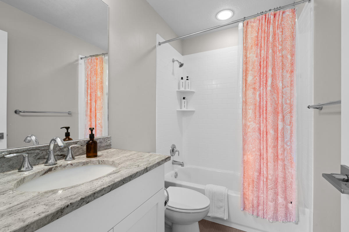 Ensuite bathroom with tub/shower combo. We provide the bathroom essentials.
