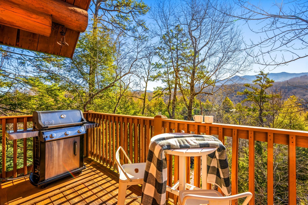 Enjoy a hot cup of coffee while taking in the mountain scenery