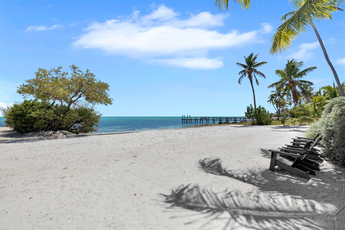 White sandy beach shared only by those living on the street 