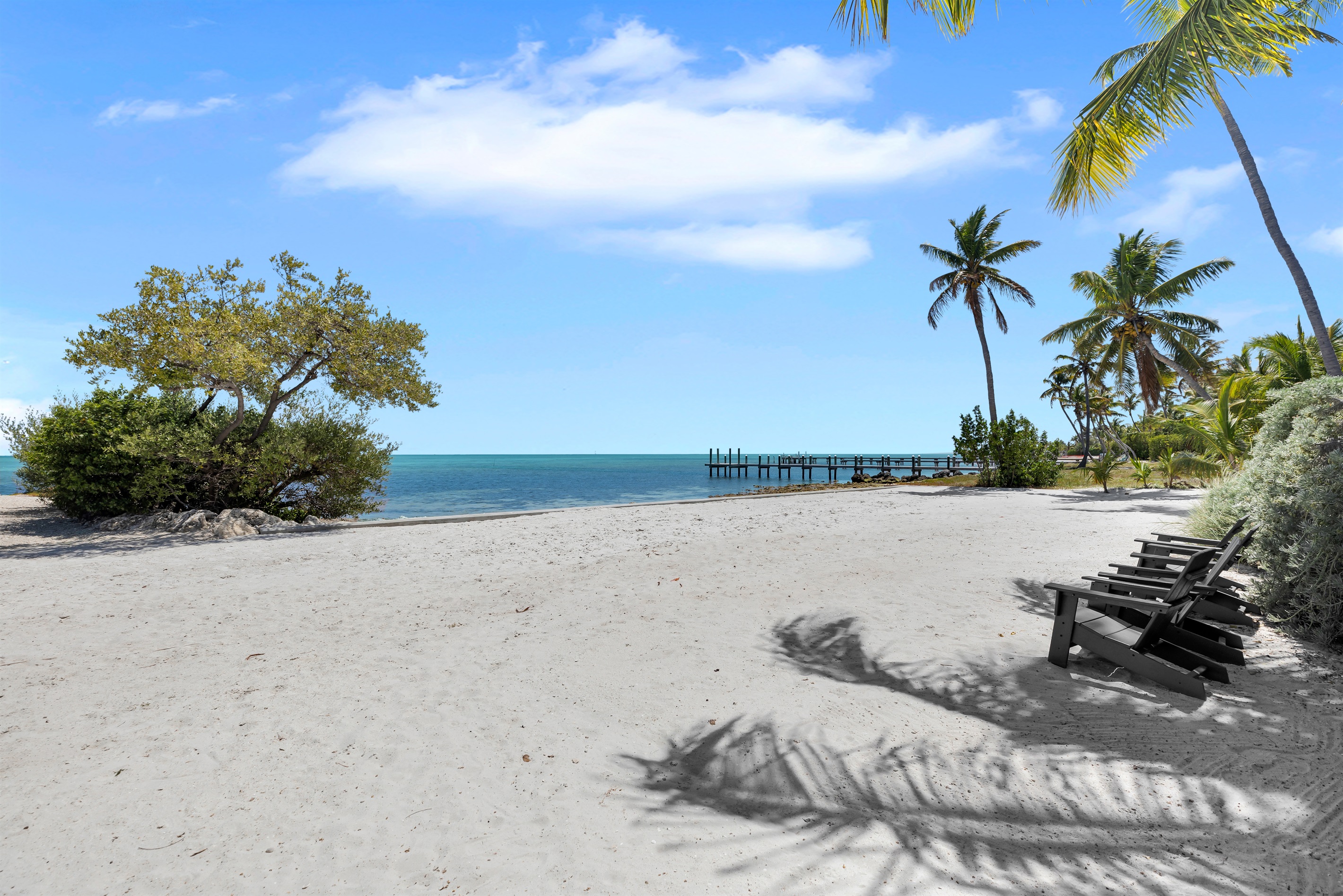 White sandy beach shared only by those living on the street 