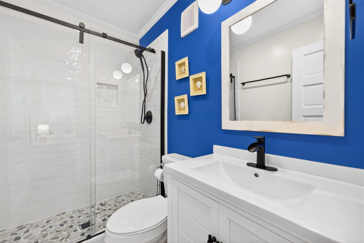 Primary Bath | Beach Break | IOP Escapes Vacation Rentals | 1400 Ocean Blvd 106B, Isle of Palms SC