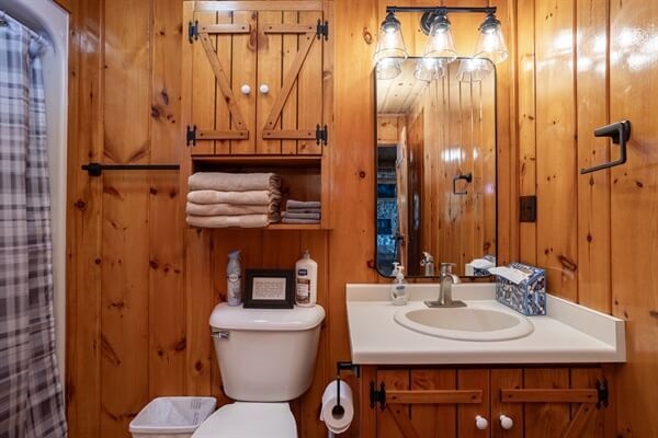 Bathroom 2 is located off the kitchen