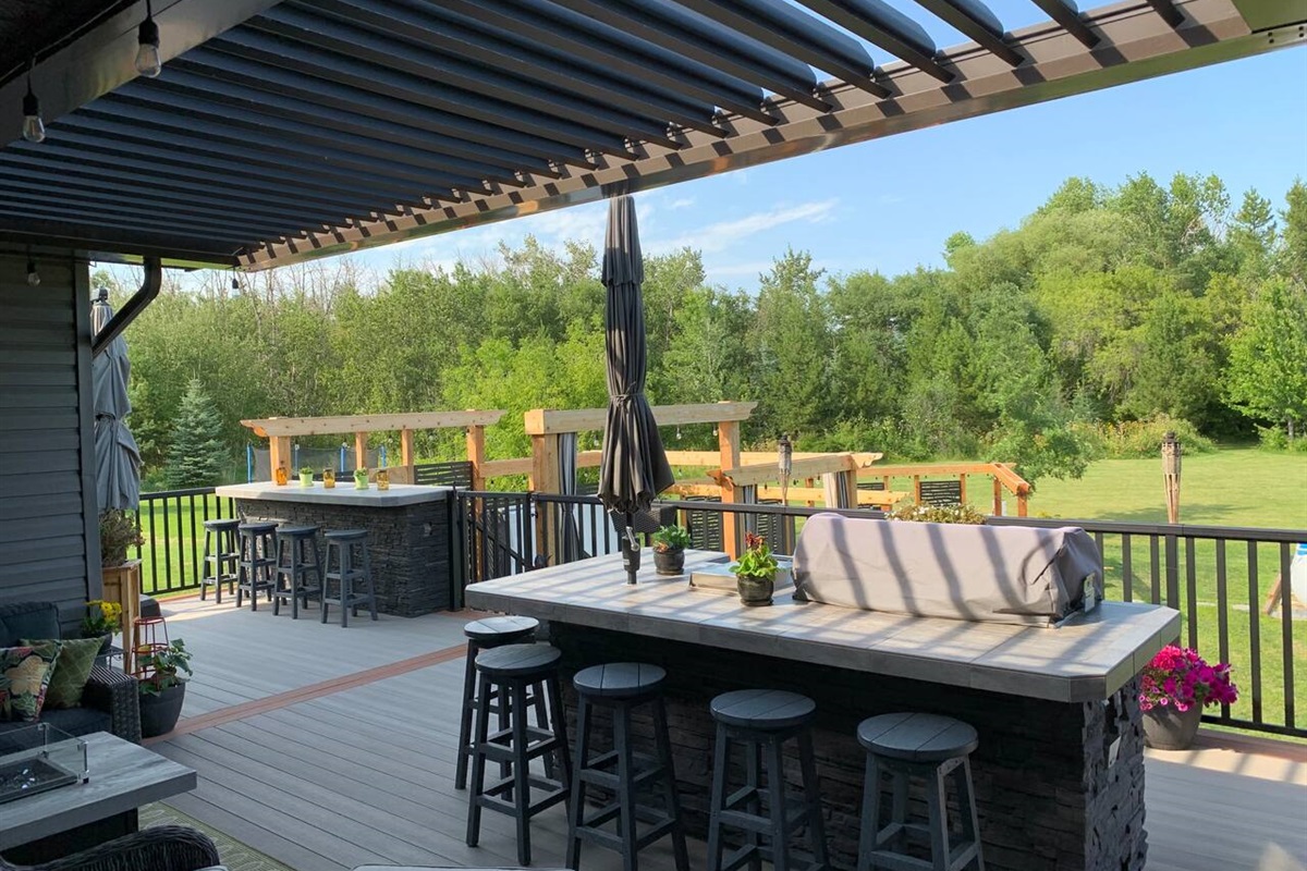 UPPER DECK COMMON SPACES. SEATING FOR 6 AT BBQ AND 4 AT EATING BAR.