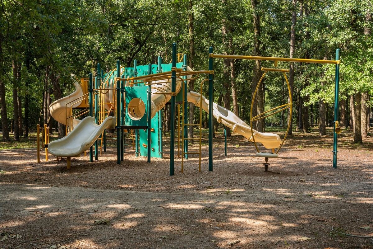 A fantastic playground just a block from home, surrounded by towering trees for shade. Featuring multiple slides, climbing structures, and interactive elements, it’s perfect for kids to explor