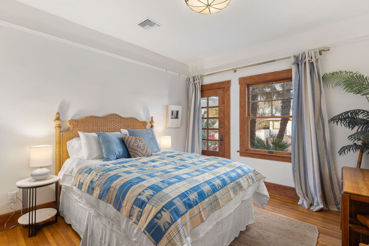 front bedroom with Queen bed, closet and desk