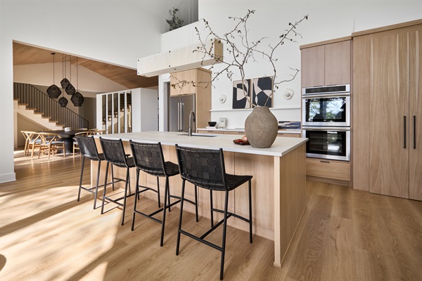 Plenty of room to gather around the island for breakfast, snacks, or wine and conversation.