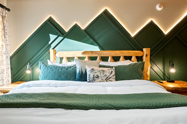 Bedroom 1 features a king bed and plenty of space to stretch out and recharge.