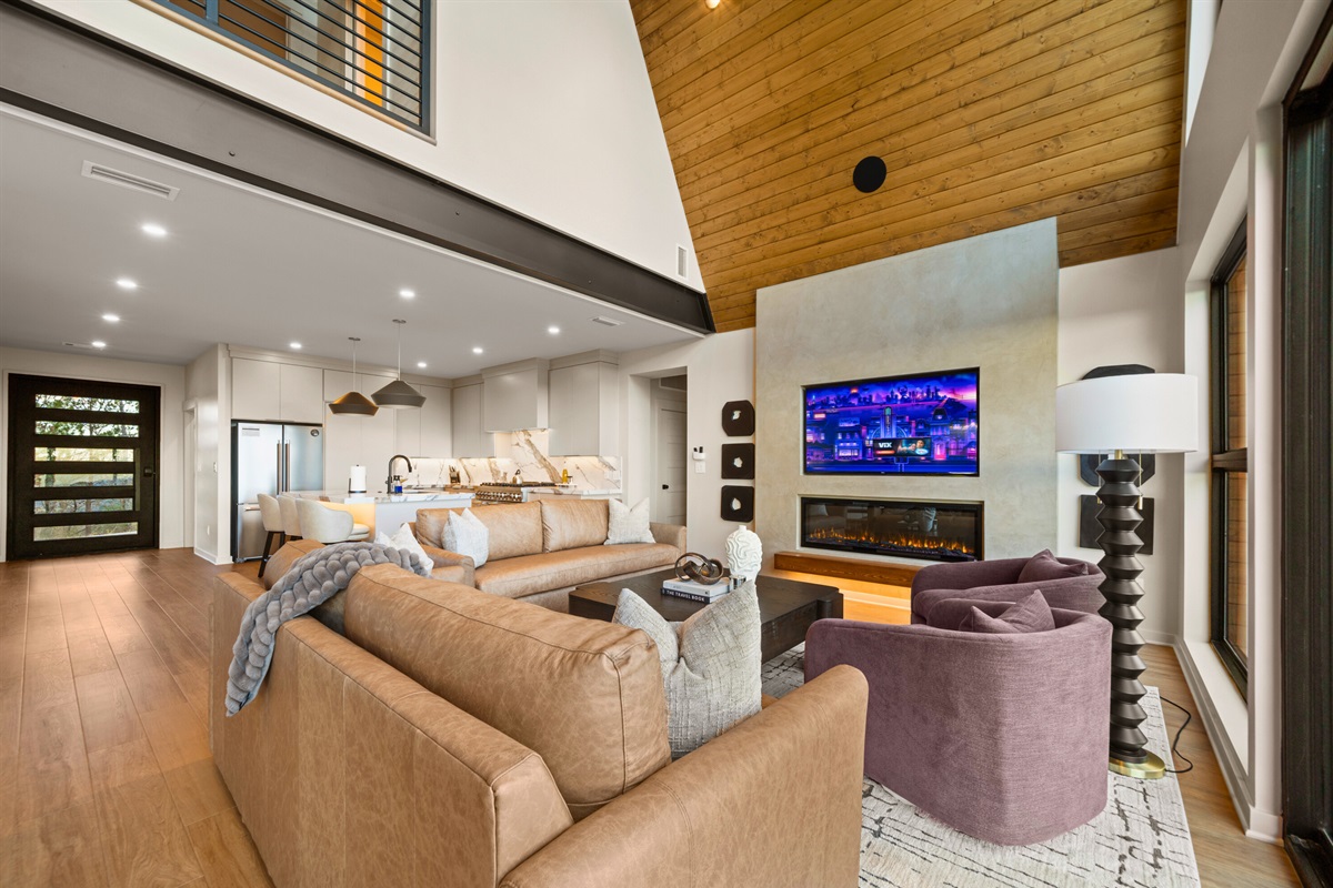 Natural light pours into this open space, making the whole main level feel bright, inviting, and perfect for slow mornings and easy evenings.