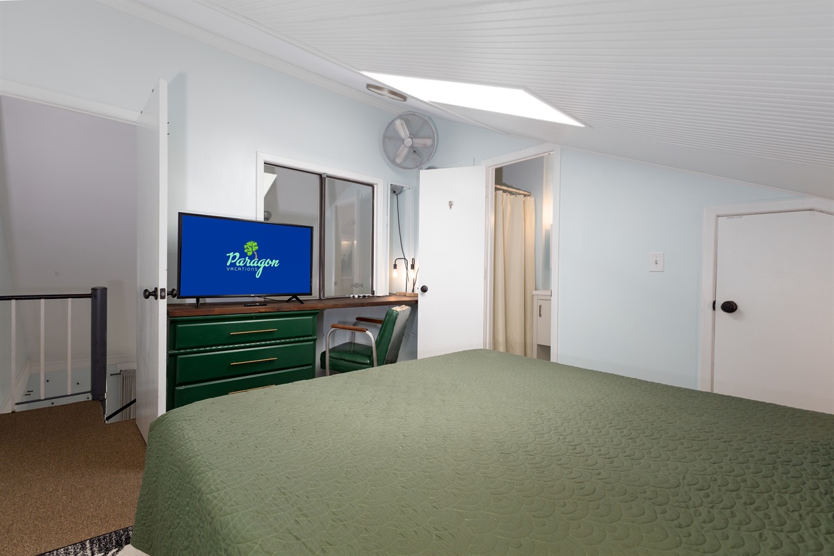 Loft bedroom with bed, TV, and dresser: great for relaxing