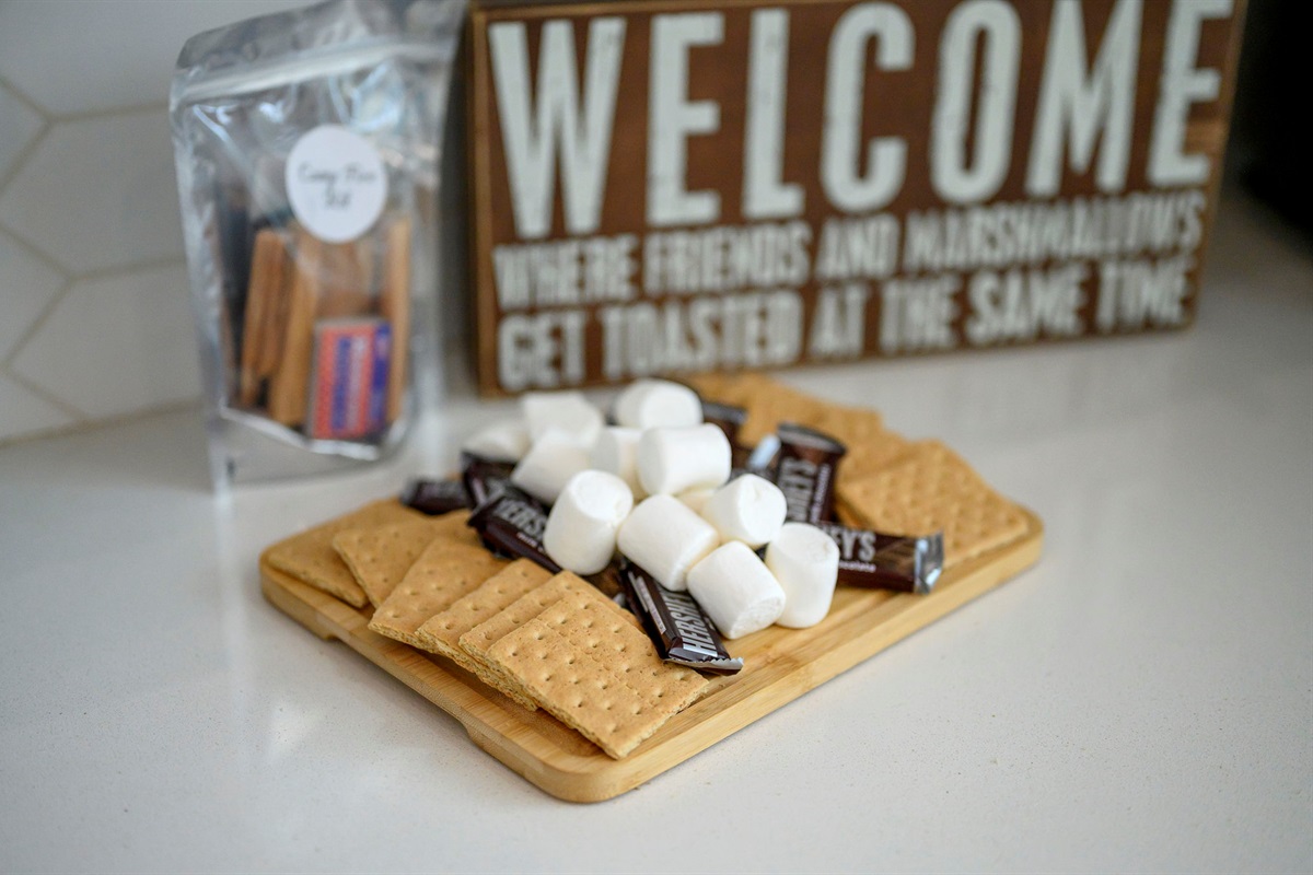 Welcome treats for guests - firewood provided for guest and a campfire kit with colored flames🔥