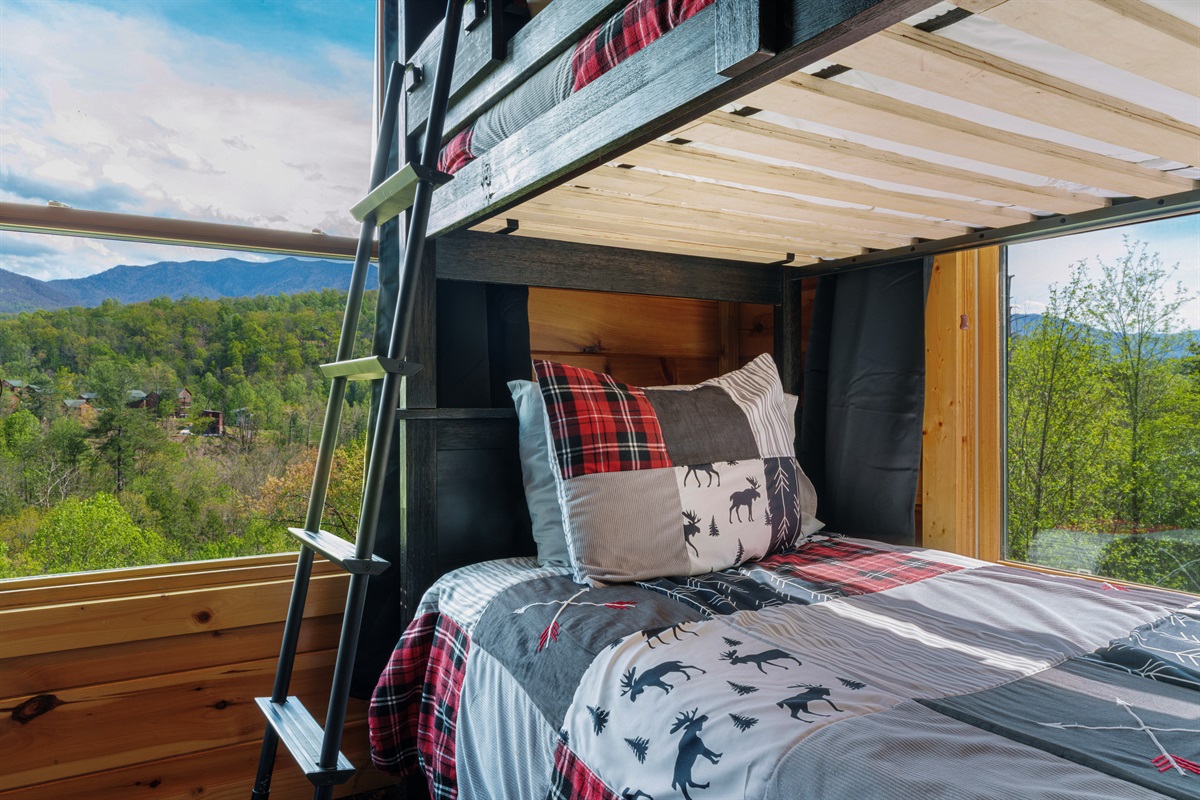 The Den sleeps up to 6 in one queen over queen bunk and one twin over twin bunk and has the largest closet.