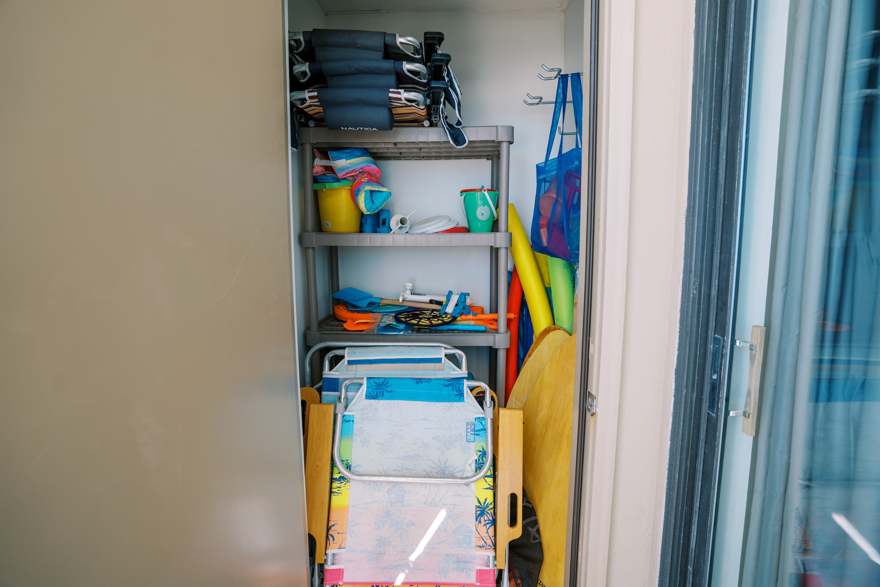 Beach Closet fully stocked - no packing needed! Beach chairs, umbrellas, toys, boogie boards, etc. You can also rent chairs + umbrella's if you don't want to carry these back and forth. Check out Ike's Beach Service!