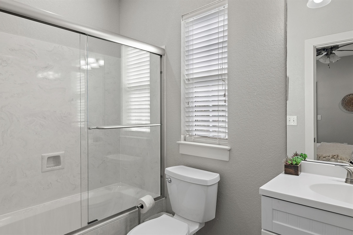 Bathroom #4: Private attached bathroom with shower/tub combo