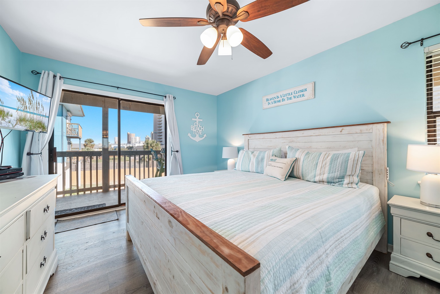 Master Bedroom.  King size bed along with master bathroom connected.  Entryway to porch