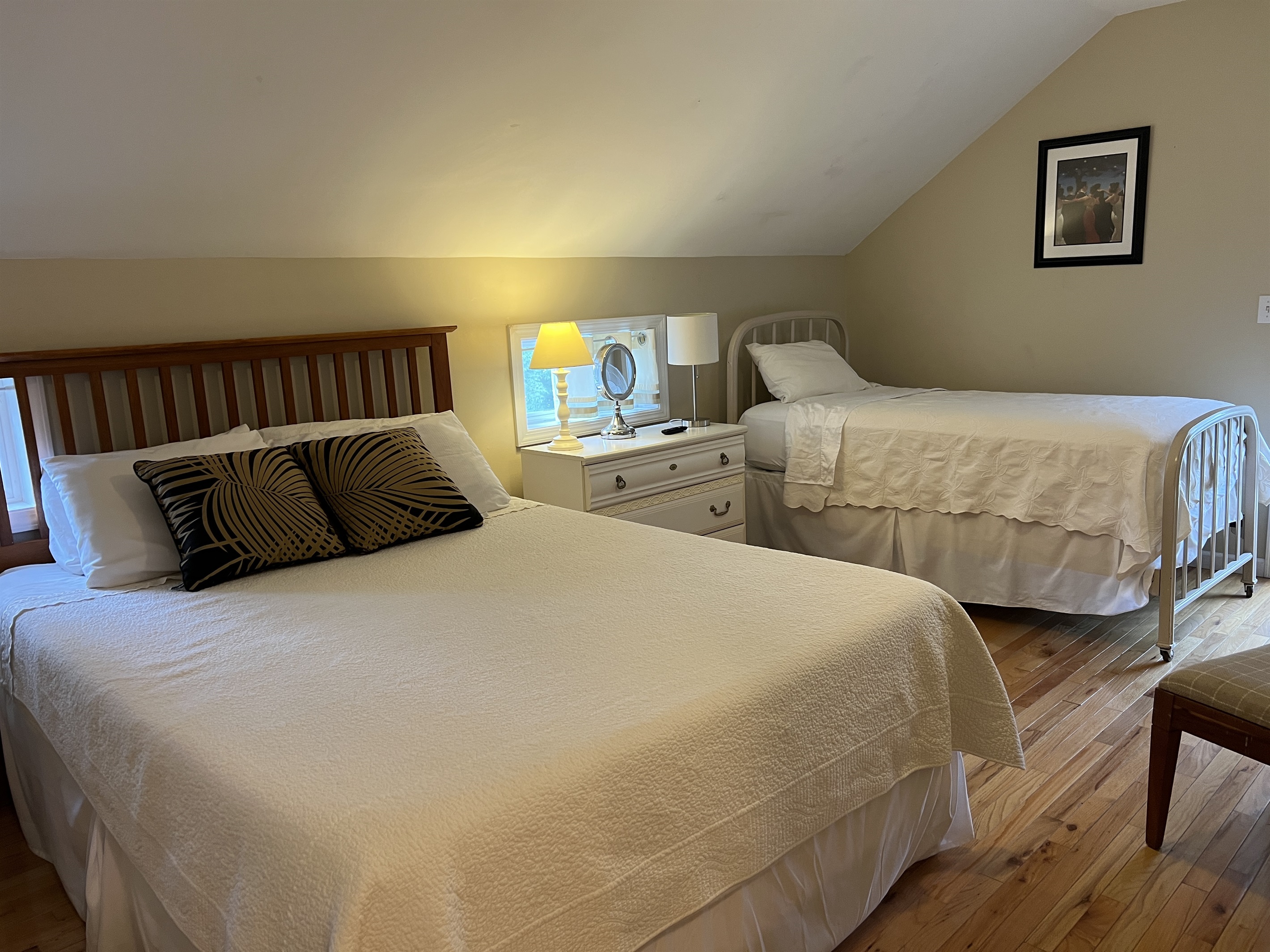 Apartment One 2nd floor bedroom #1 w/ Queen and Twin beds.