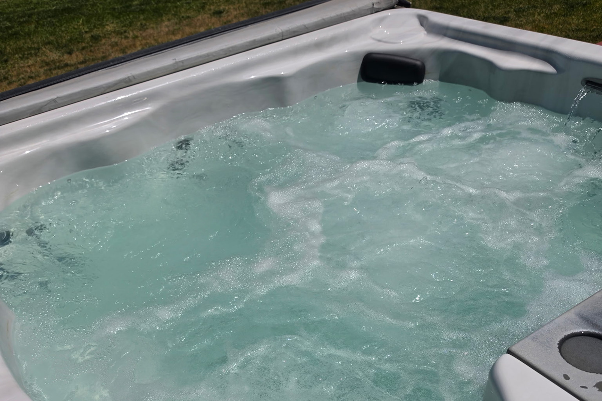 Crystal-clear, well-maintained hot tub.
