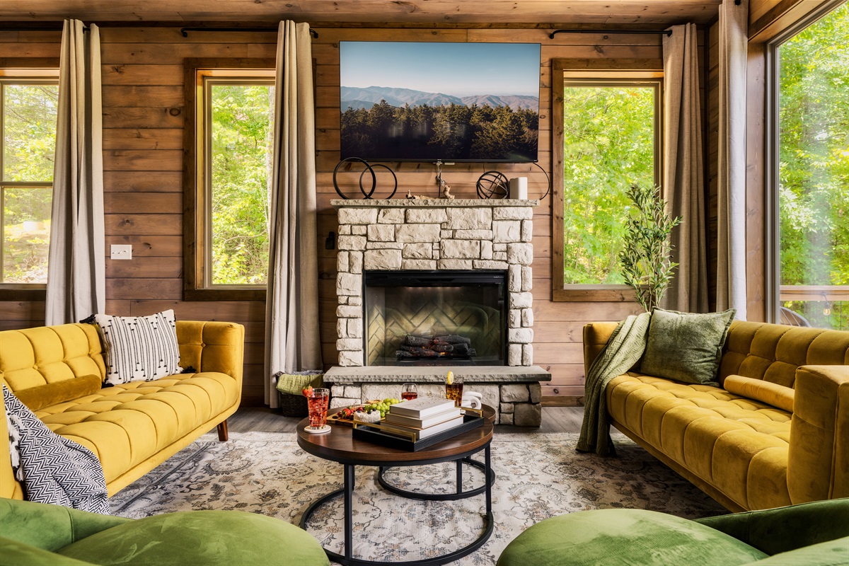 Stylish living room with lush seating, electric fireplace, perfect for family time