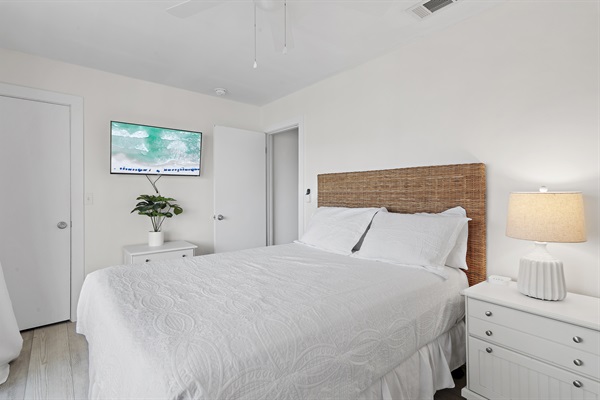 Charming Guest Bedroom: This room boasts a comfortable queen bed and a fun bunk bed setup, complete with a private balcony, making it perfect for families.