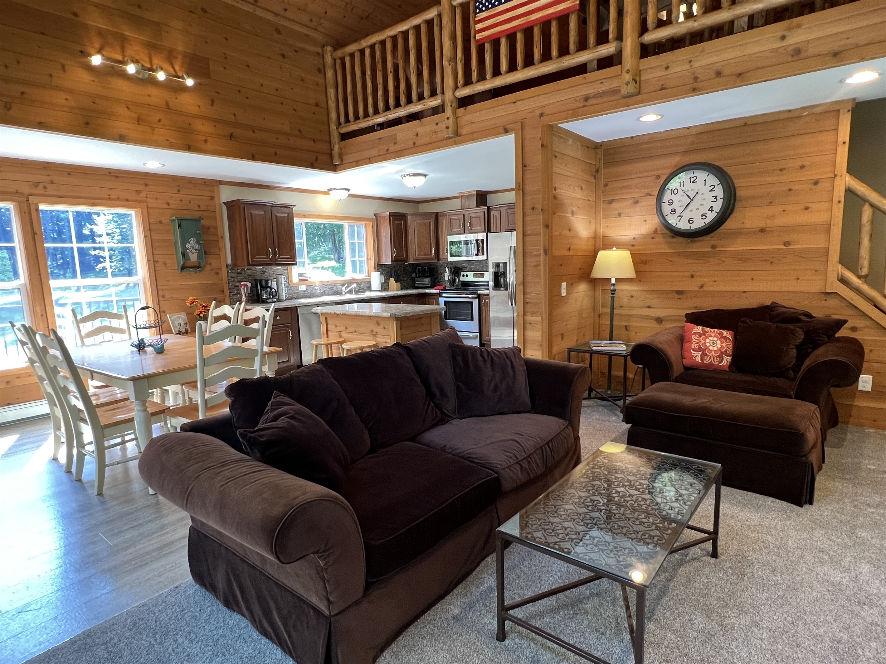 Open floor plan living, dining and kitchen area