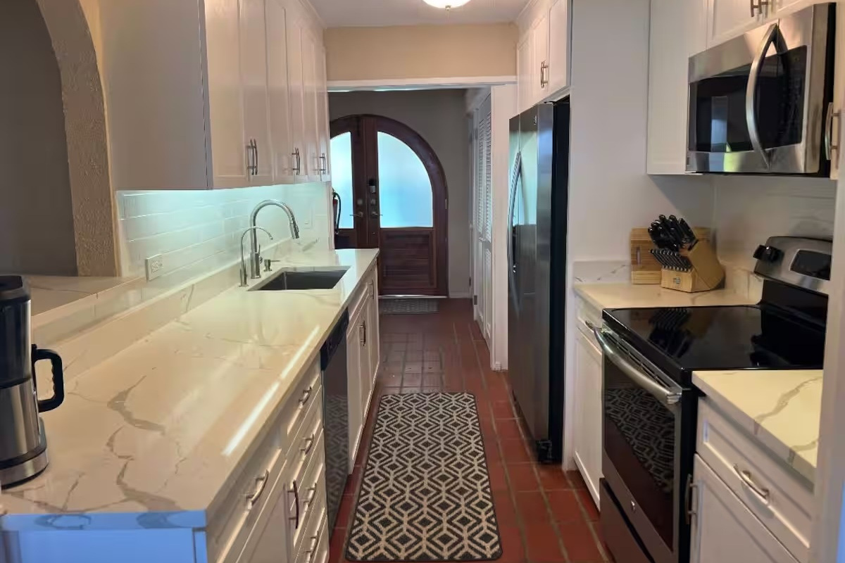 Prepare meals with ease while enjoying a bright and functional space.