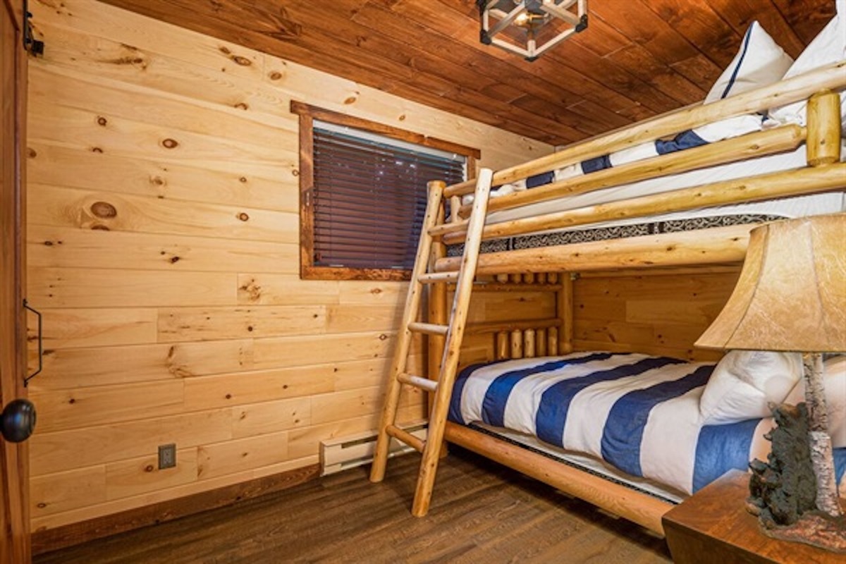Bunk bedroom with multiple sleeping spaces