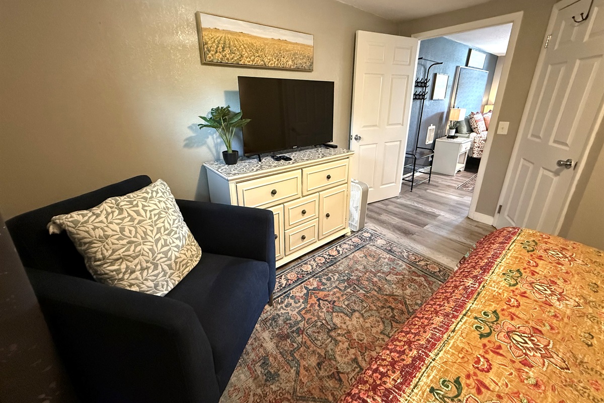 Both rooms have a tv.