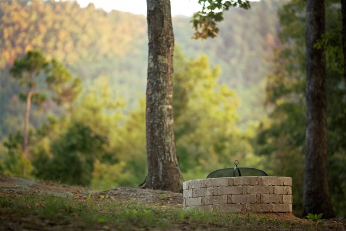 Fire pit with mountain view at Storybrook Cottage