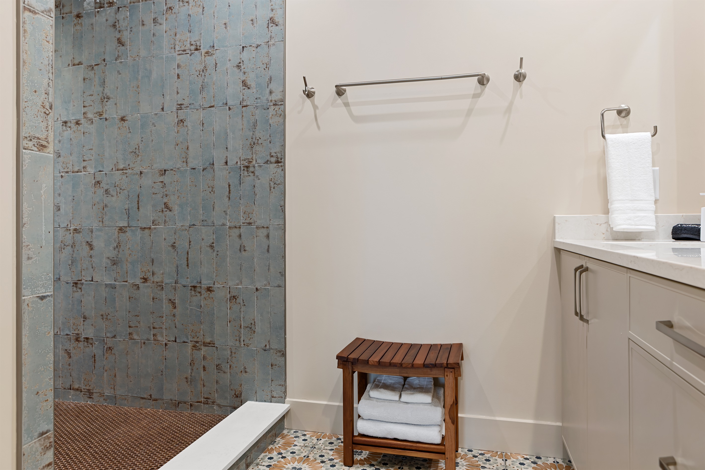 Gorgeous copper shower to start your day | bath linens provided