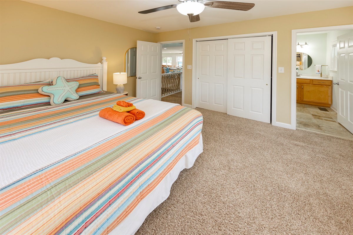 This 2nd floor Queen room which is adjacent to the main living area has its own TV & en suite bathroom