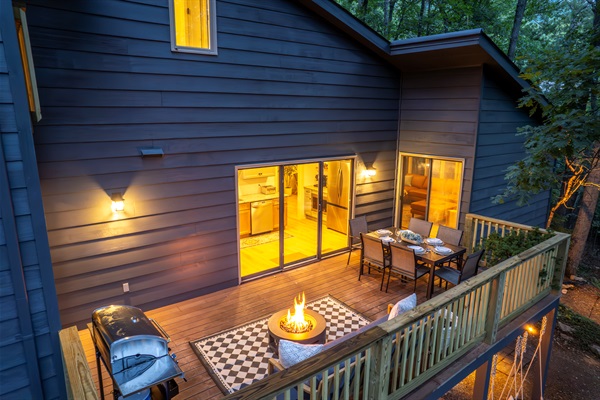 Grill, fire pit and outdoor dining all accessible from the main level of the home. 