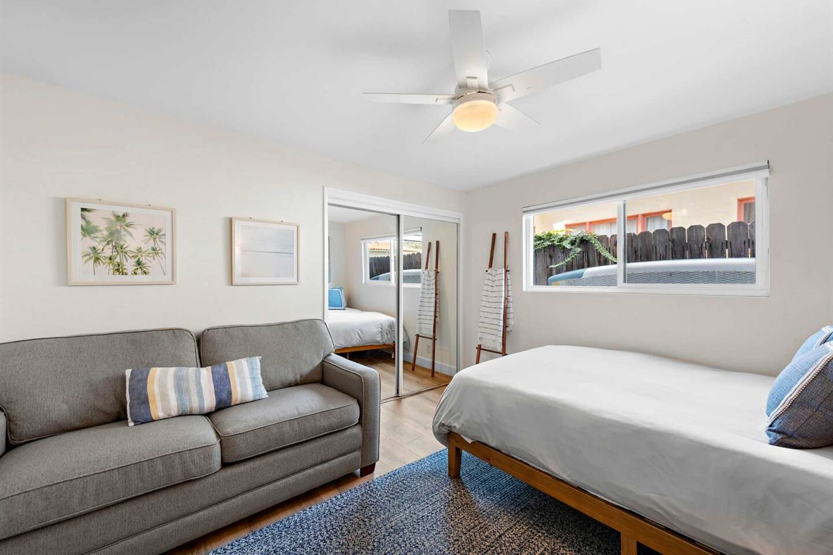 Our second bedroom has a queen bed and a very comfortable memory foam sofabed.  