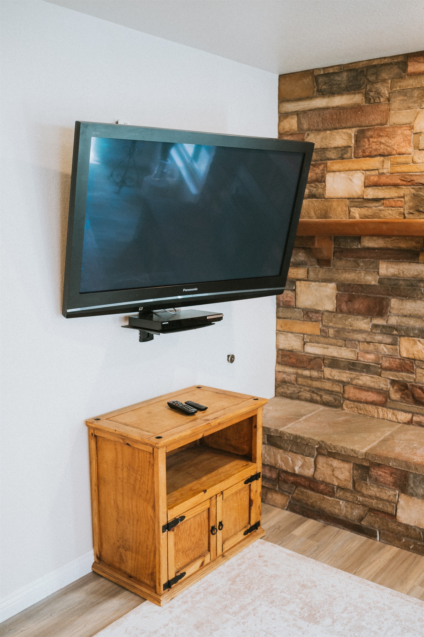 Enjoy a cinematic evening in this polished living space.