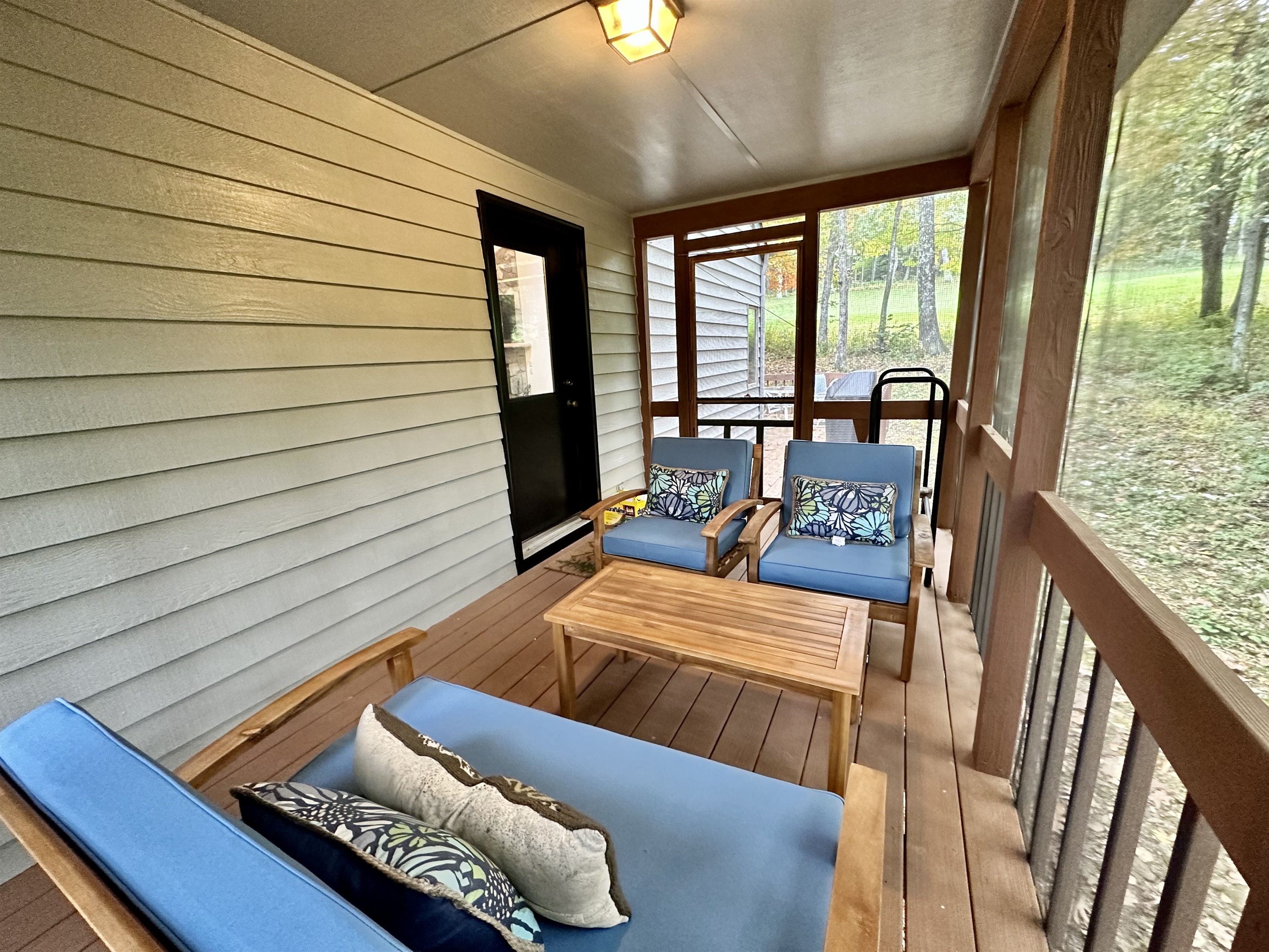 screened in porch just outside the kitchen door
